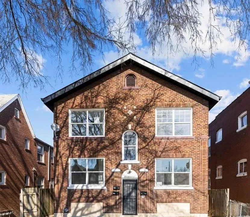 6037 W Florissant Ave