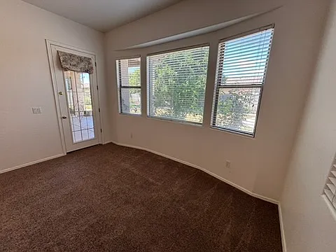 Master bedroom with doors to the backyard