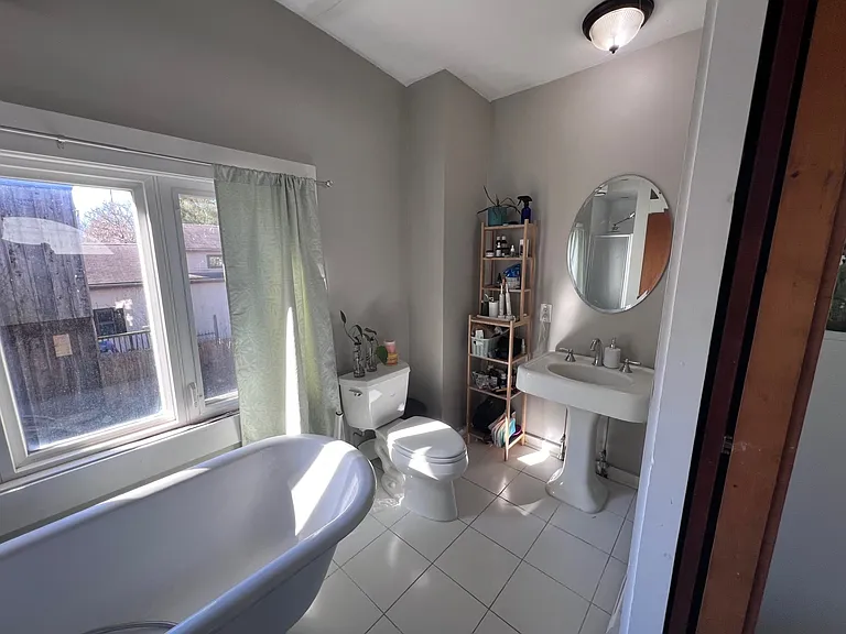 Bathroom accessed from hall or Master Bedroom