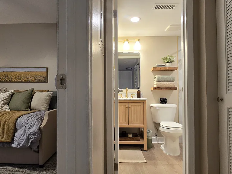 Flexible office or guest bedroom with direct access to the fully renovated guest bath.