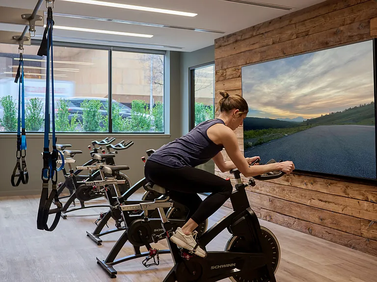 Fitness center featuring spin and cardio equipment