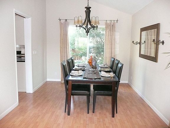 Formal Dining Room with Vaulted Ceiling