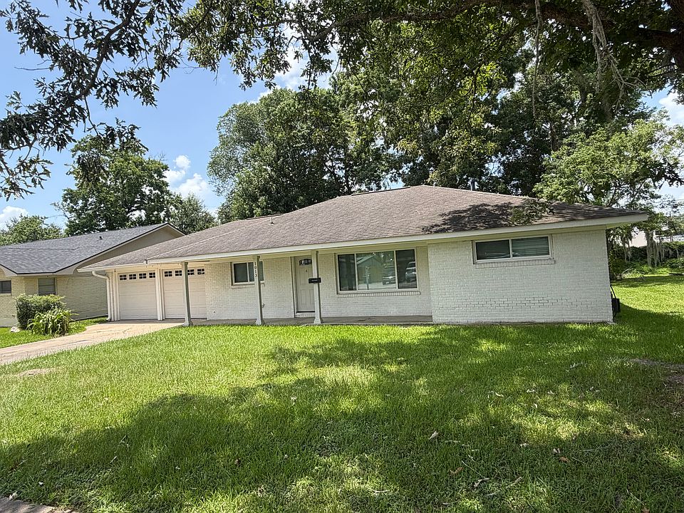 Two bedroom one bath two car garage home.