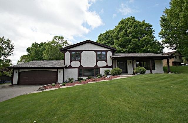 Stunning home with huge 31x21 garage and additional parking strip along the side.