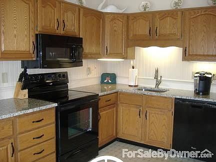 Kitchen updated this spring!
						:
						Granite counters, new appliances in this spacious eat-in kitchen.