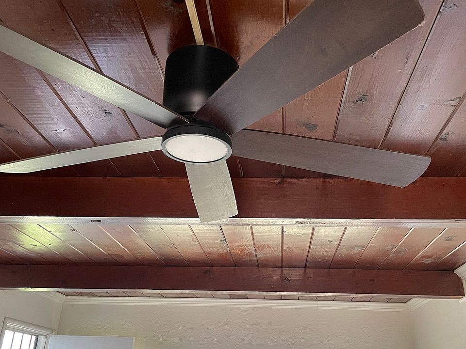 Livingroom wood ceilings and ceiling fan