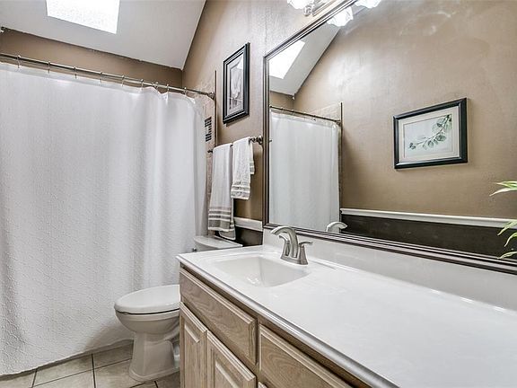 Bathroom between two bedroom