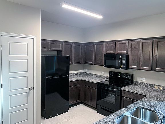 both units come with a freezer on top refrigerator. This is a picture of the actual unit with correct refrigerator installed.