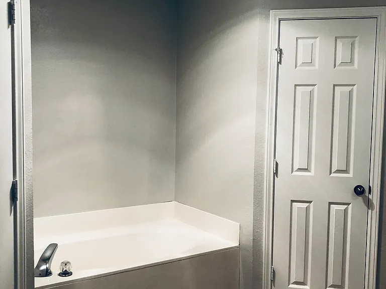 Master bath. Shower, tub, and double walk-in closets