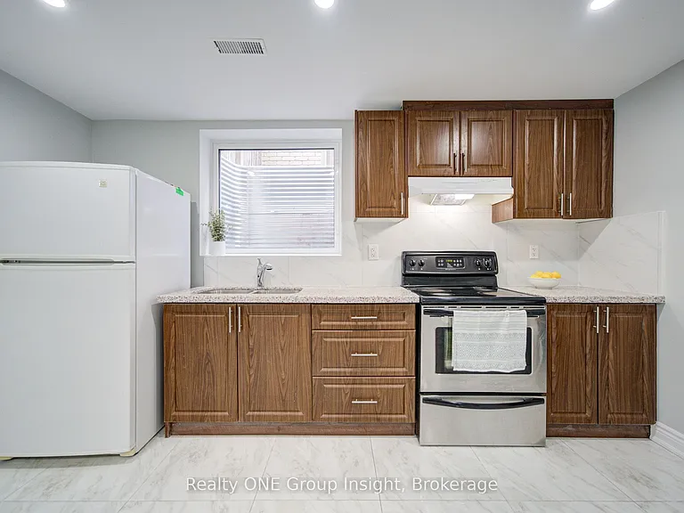 348 Britannia Ave E #BASEMENT — Photo 13