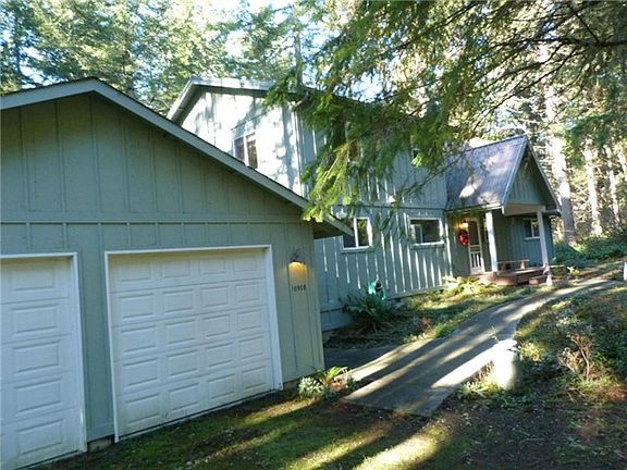 Garage is tandem, so enough room for four or two and a work shop