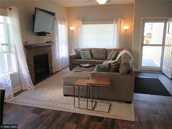 Bright and airy living room with fireplace