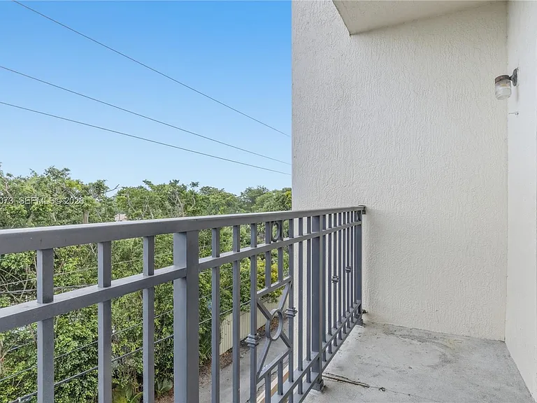5271 SW 8th St #304 — Photo 12