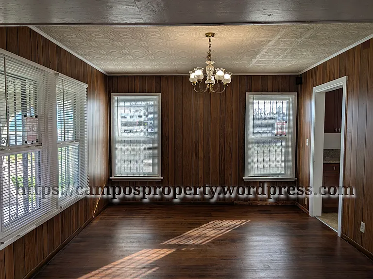 Dining room with antique chandelier.