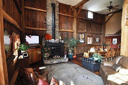 Living Room - featuring a huge gas Mendota fireplace with stone chimney