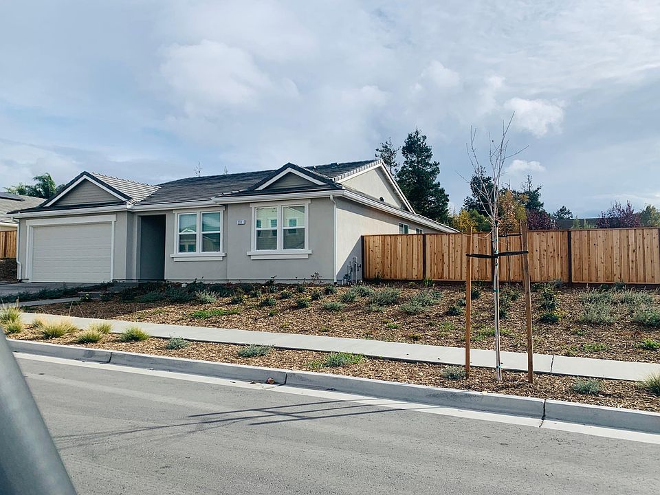 Enjoy minimal maintenance and a spacious .25 acre with fantastic side yard_perfect for outdoor living, gardening, or simply throwing the football around with family and friends.