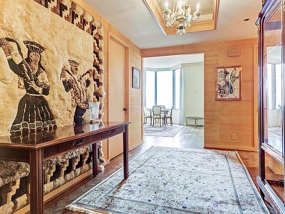 The spacious entry has room for lots of art pieces.