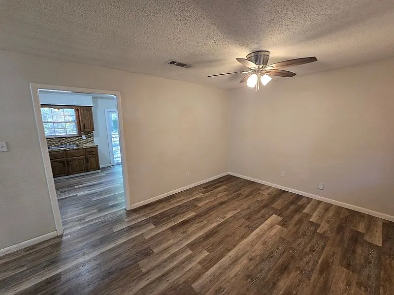 Charming 3-Bed Home with Carport, Spacious Backyard & Stylish Upgrades — Photo 2