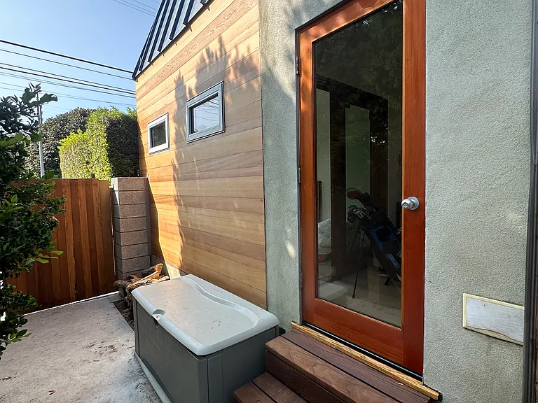 One of the two side doors to the outdoor dining area