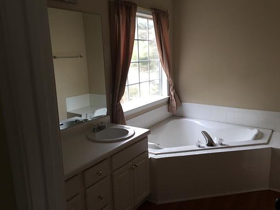large soaking tub in master bath (standing shower separate)