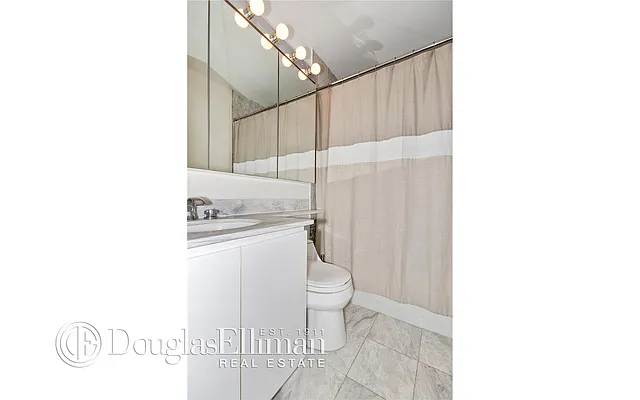 Sold by Douglas Elliman | media 13