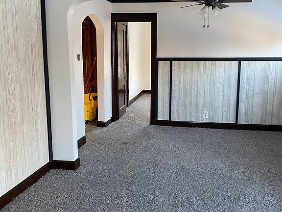 DR from LR, doorway to BR. Archway leads to BR, bath, Kitchen and entrance.