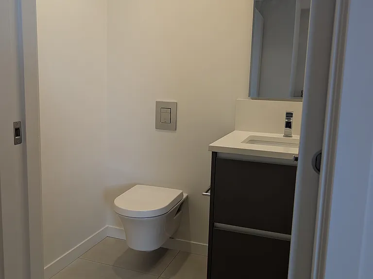 Half bath attached to bedroom 2