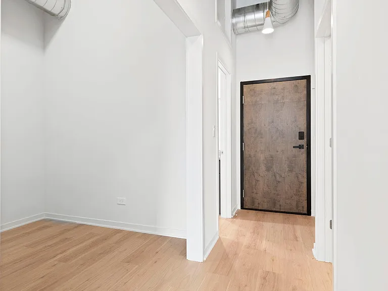 Den, as viewed from hallway. Perfect for work-from-home, an exercise room, or a bonus room.