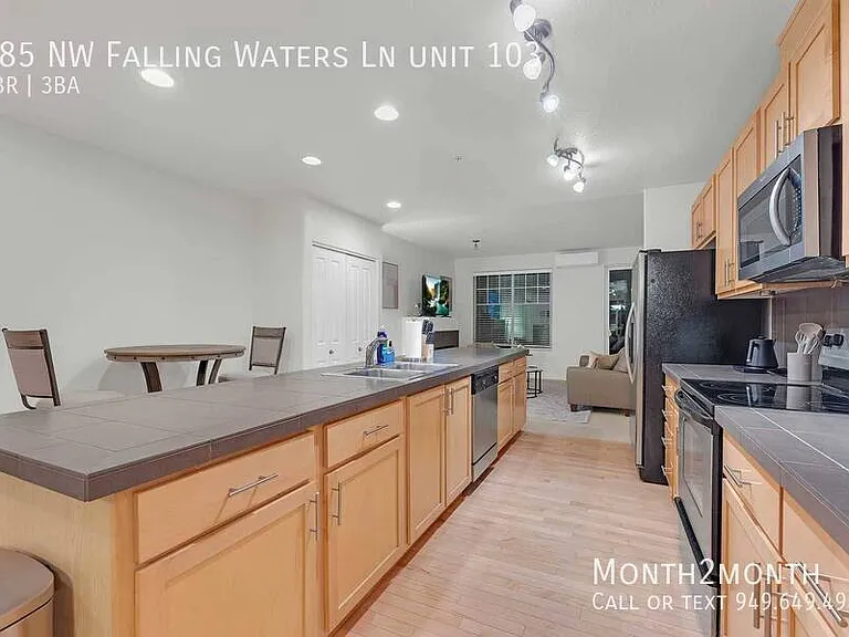 685 NW Falling Waters Ln #103 — Photo 11
