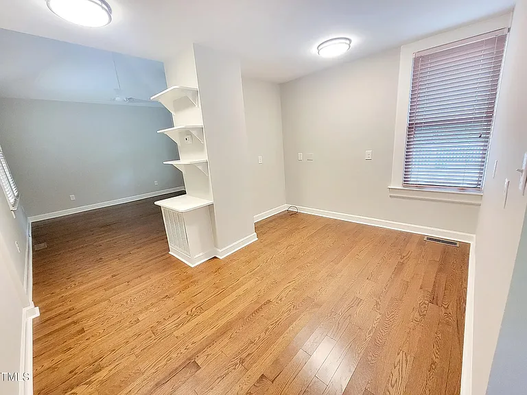 Primary bedroom with office or sitting area. Includes a huge walkin closet and private bathroom