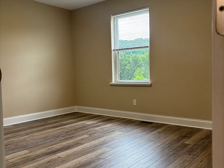 guest bedroom 1 with phone & cable hook up