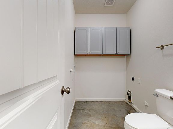 separate laundry room and half bath downstairs. New washer and dryer can be added for $75 per month.