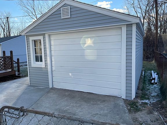 Newly painted garage and all new cement and porch in the back.