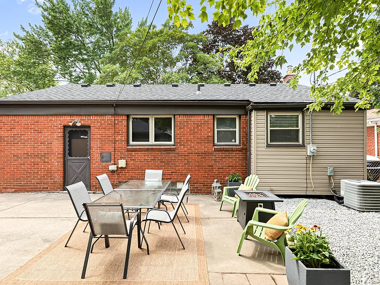 The patio offers stunning views of the surrounding neighborhood.