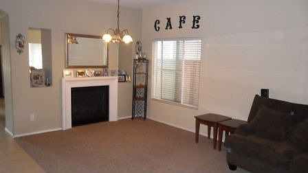 Large living and dining area with fireplace