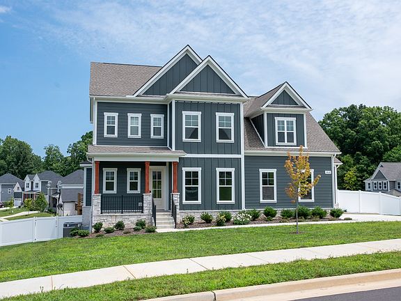 Stunning exterior on corner lot, with side entry 3-car garage at Richvale Estates in Fairview, TN.