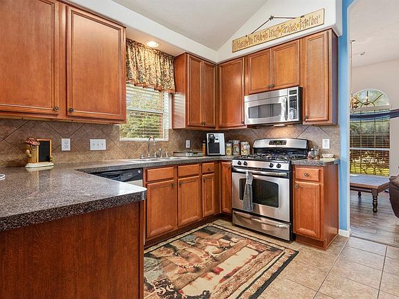 The open kitchen allows the chef to be a part of all that's going on in the large family room.