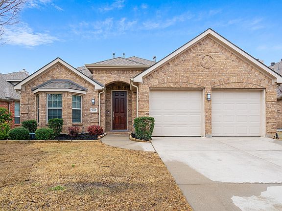 1312 Burnett Drive, a beautiful 4 bedroom home, is nestled in Lantana's Heritage community.