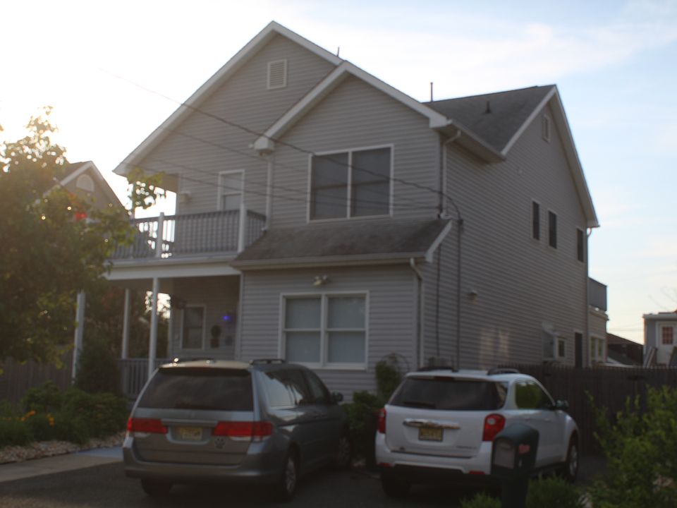 Front of house, with balconi