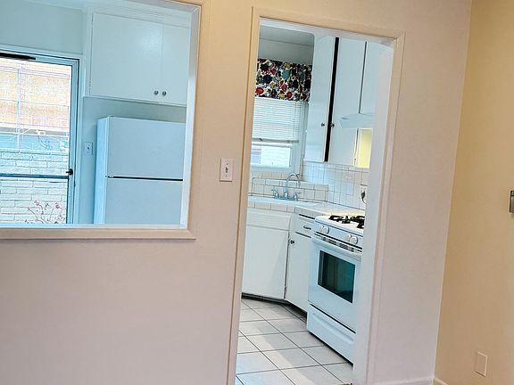 Open Kitchen and Back Door to Patio