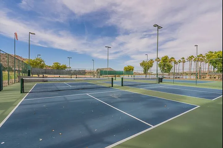 4 newly resurfaced pickleball courts, a tennis court, and 2 sand volleyball courts are located at the South Lake.