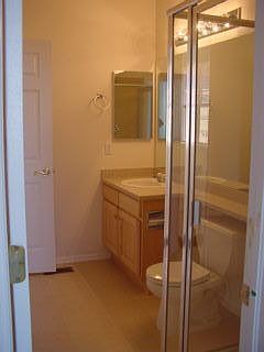 One of three baths, all with bathing facilities (jacuzzi in master)