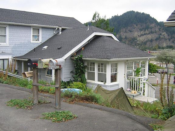 Front View of 4 bedroom 2 bath with Sun Room-2 story home