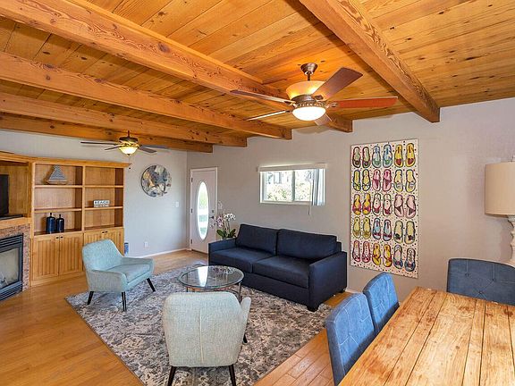 Cozy living room with a gas fireplace which heats the whole