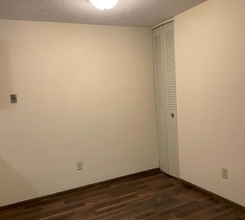 Eat in area with new flooring and a pantry