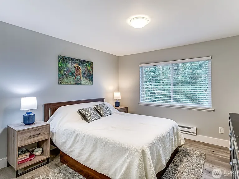 The Primary Bedroom backs to the territorial view. It is much bigger than it looks and fits a king-sized bed and 2 nightstands, with oodles of room left over!