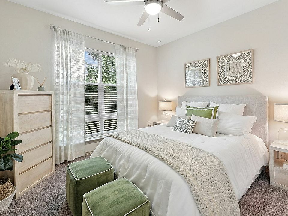 Bright bedroom with large window