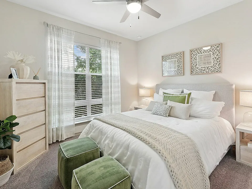 Bright bedroom with large window