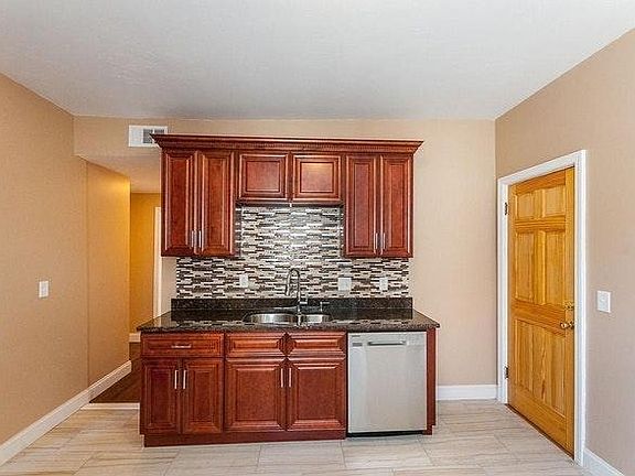 Brand new double sink with disposal and dish washer