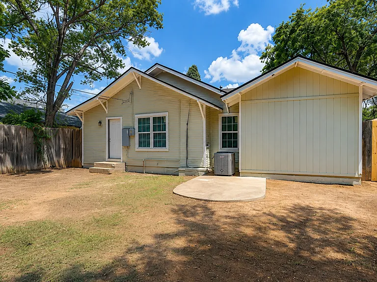 Spacious Backyard _ Enjoy a large, fenced backyard with plenty of room to relax, entertain, or enjoy the outdoors. A private rear entrance provides convenient access to the home.
